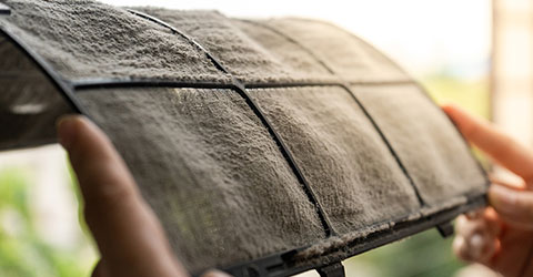 汚れたエアコンフィルターイメージ